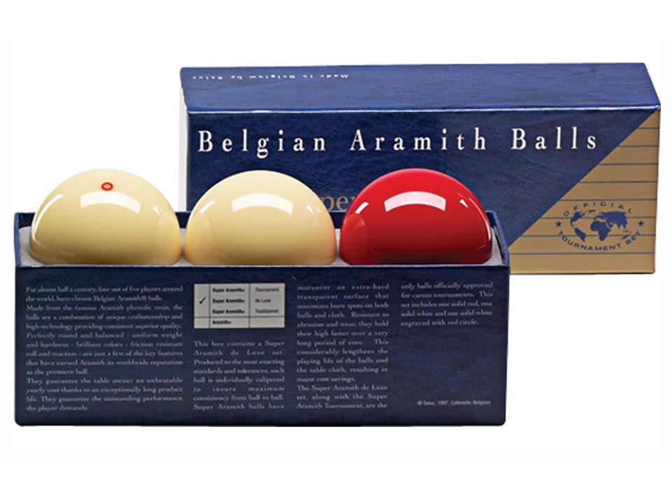 Close-up view of Super de Luxe billiard balls in a box.