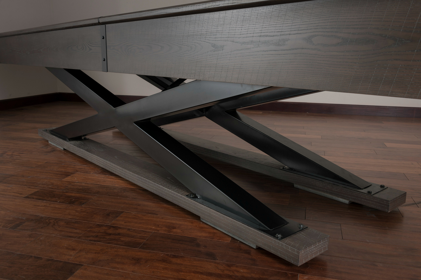 Bottom view highlighting geometric black leg structure and base frame