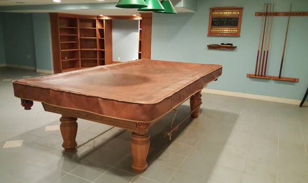 Side angle displaying wooden storage compartment and table construction