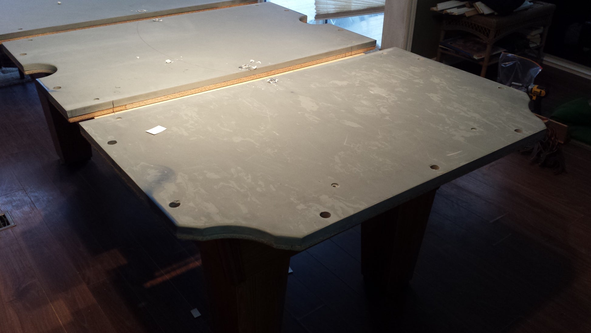Preowned table top without felt showing wear and mounting points
