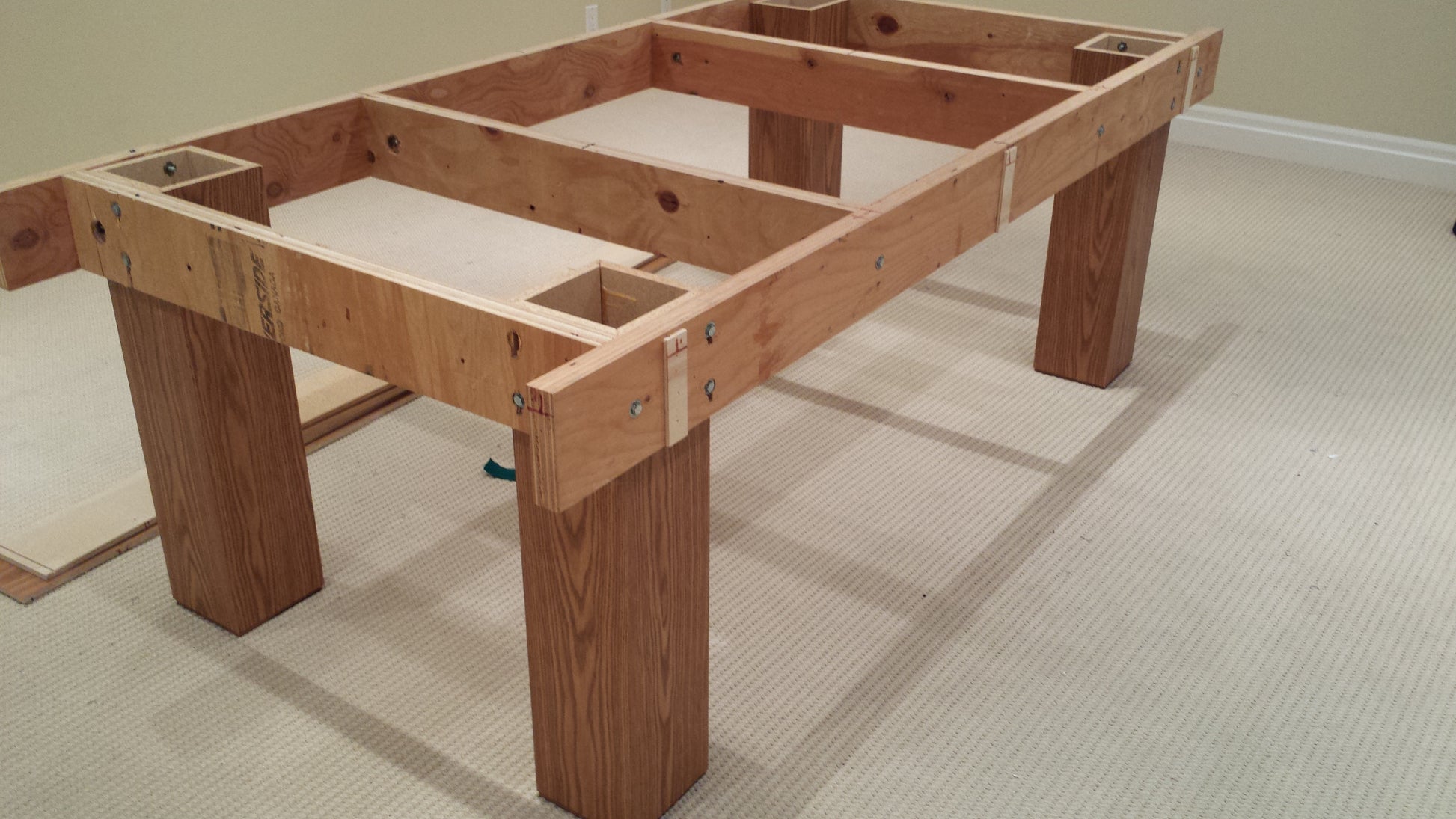 Pool table frame construction without felt showing internal wooden structure