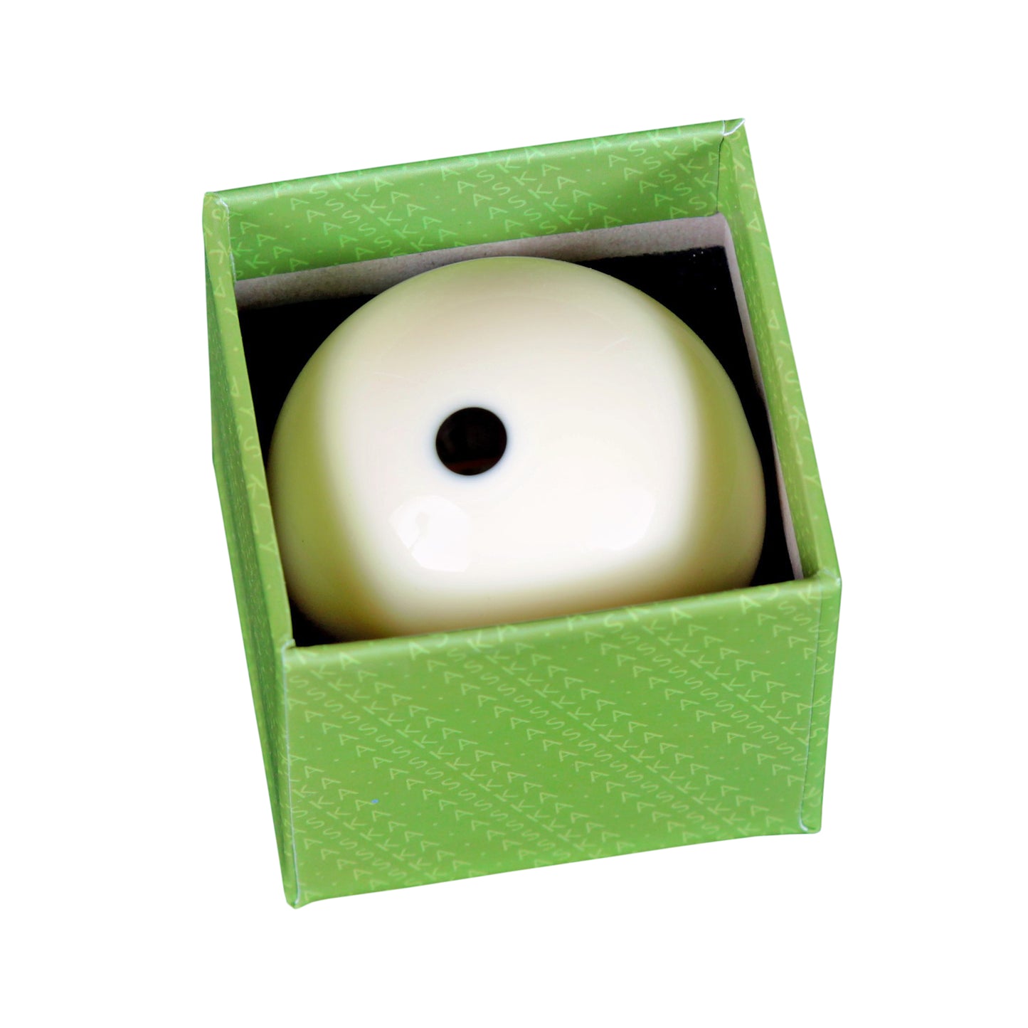 White billiard ball with single black dot sits in green box.