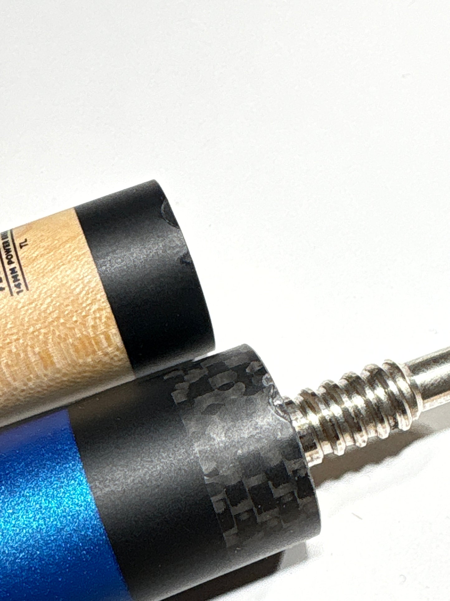 Detail view of the Grade B Pure X HXT joint showing the minor surface ding near the connection point.