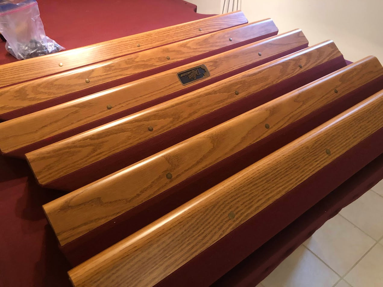 Multiple wooden rails arranged in graduating angle display