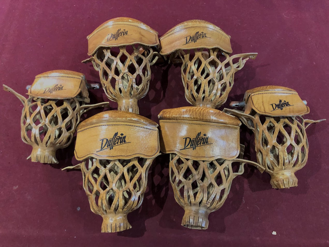 Set of six woven leather pockets with Dufferin branding overhead view