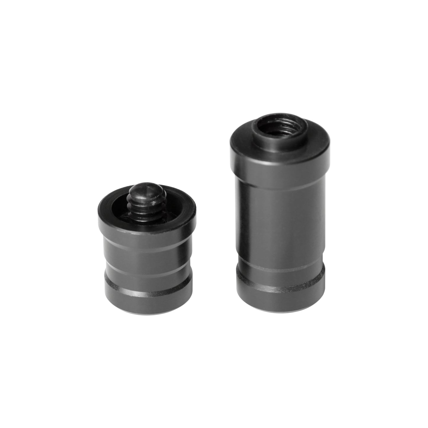 Close-up of two black joint protector halves with internal threads visible.