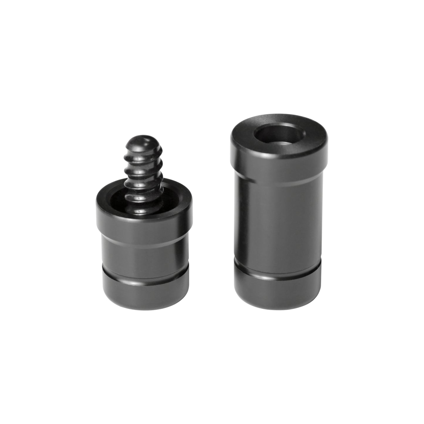 Set of pool cue joint protectors with visible screw threading and smooth finish.