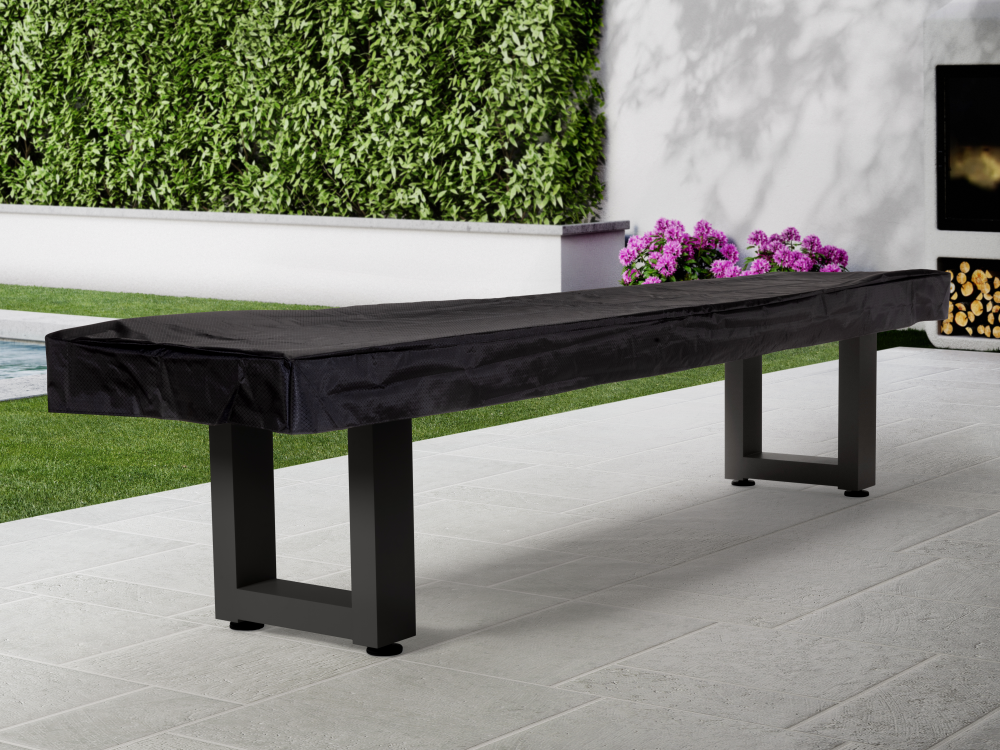 Shuffleboard table with storage compartment visible under playing surface