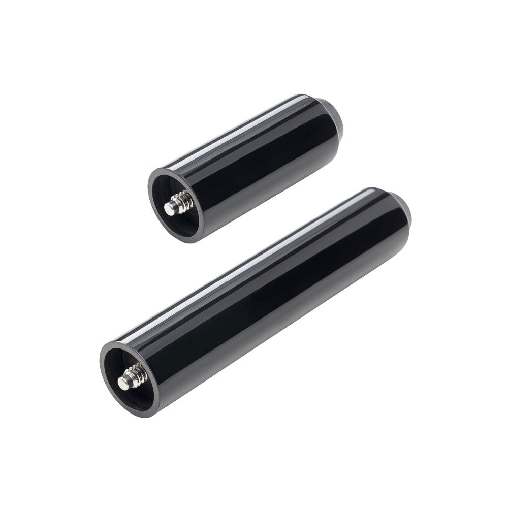 Close-up view of threaded ends on two cue extension pieces.